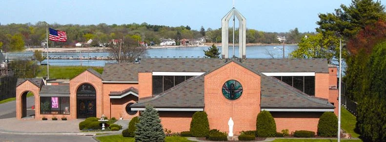 Our Lady Star of the Sea church on Shippan Avenue, with Long Island Sound behind it